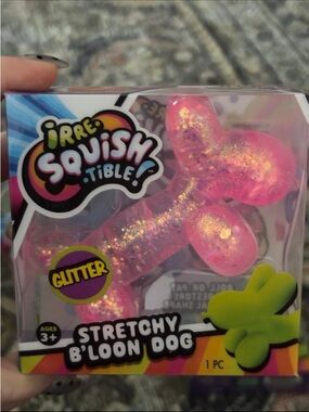Irre-squish-able Glitter Pink balloon dog.